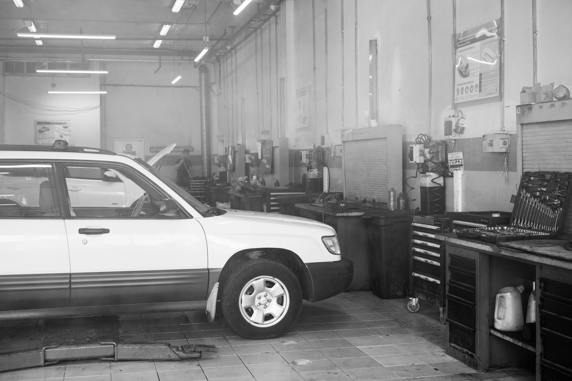 side view of a car in a garage